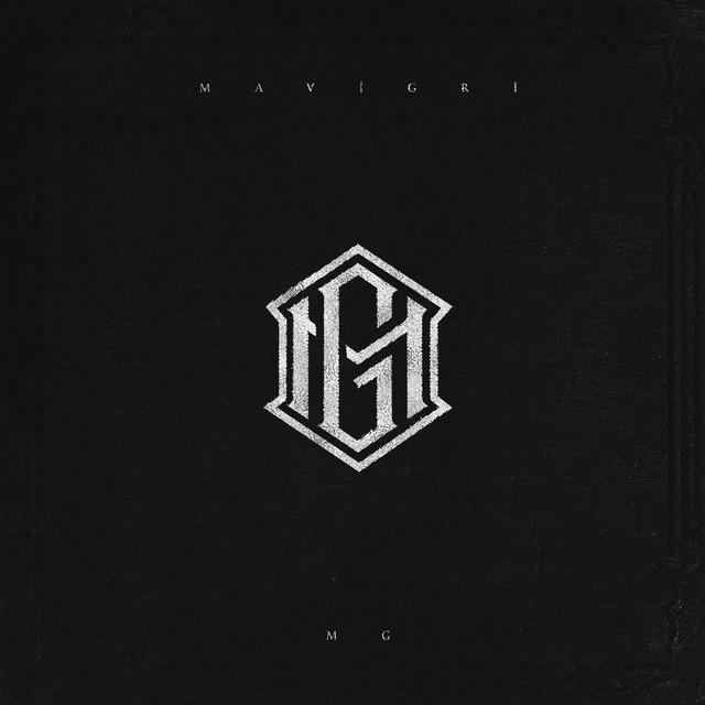 MG